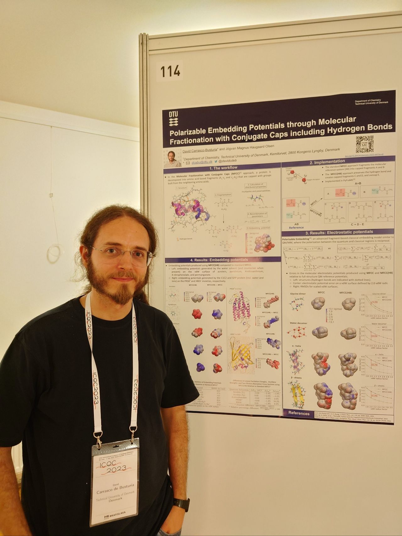 David presenting his poster at ICQC 2023