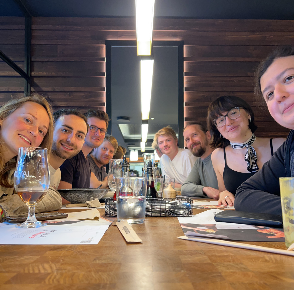 TCBC group and visitors around the table at the restaurant